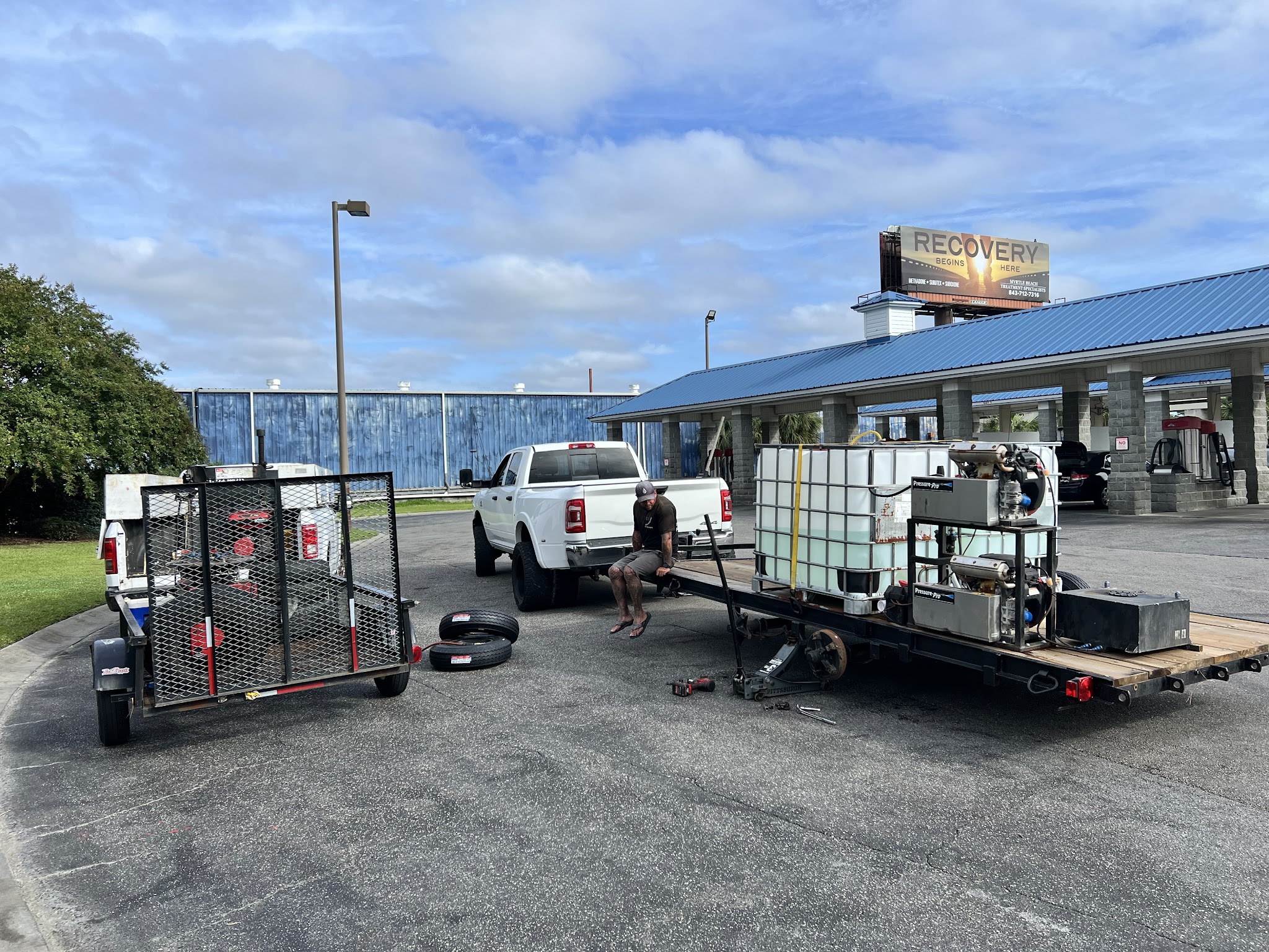 My work truck, trailer and new tires set up at a job